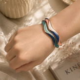 دستبند النگویی میناکاری زنانه موج دار